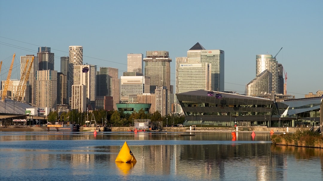 Modern city skyline with skyscrapers and water