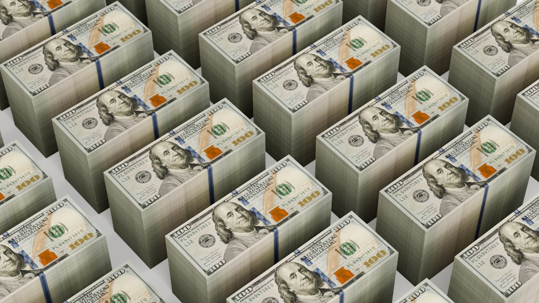 Stacks of $100 bills are neatly arranged.