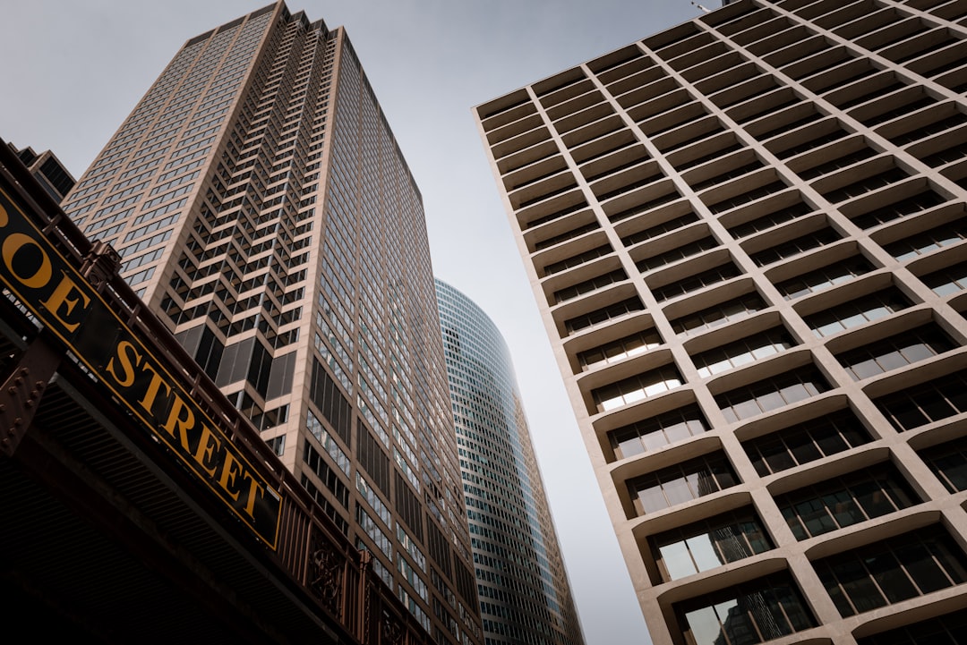 A couple of tall buildings next to each other