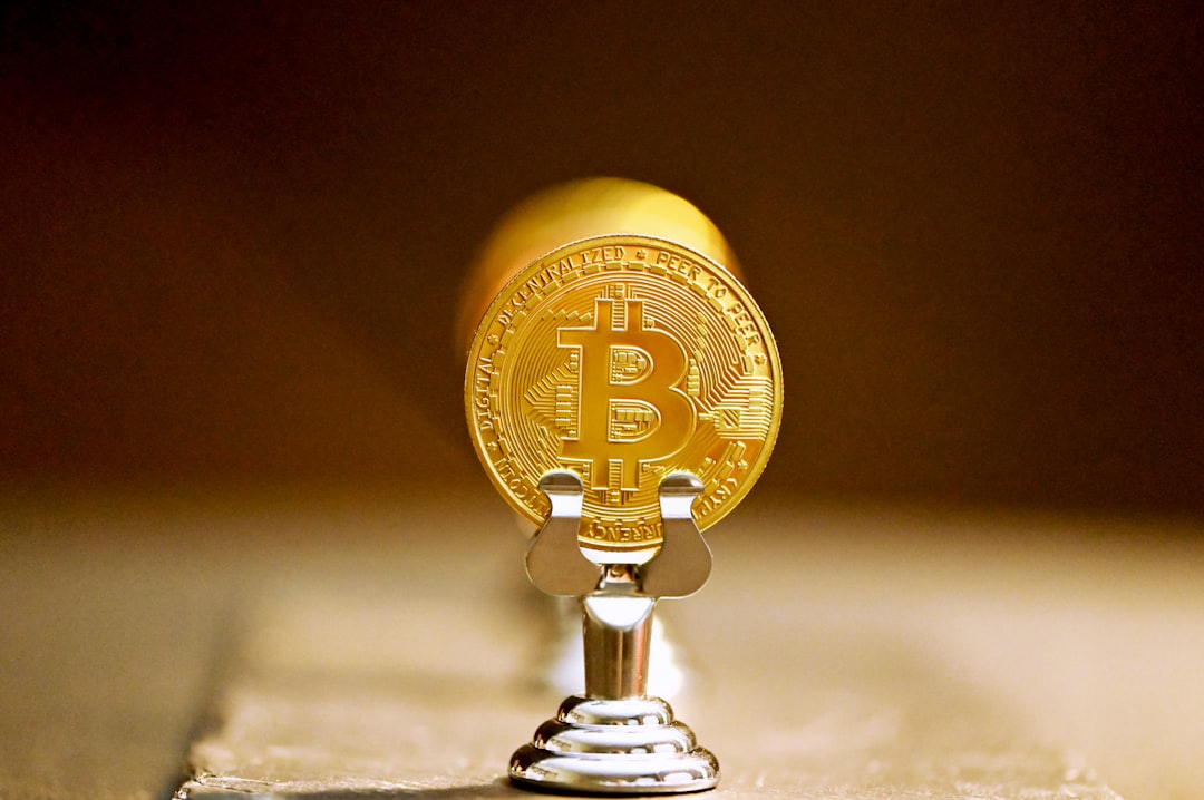gold round ornament on white table